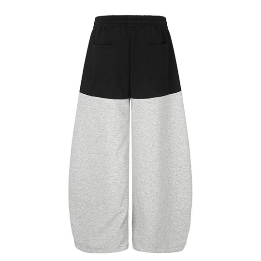 Damen Oversize Two‑Tone Palazzo‑Sweathose aus French Terry mit Logo‑Nieten, Tunnelzug und verstellbarem Saum Shop Nory