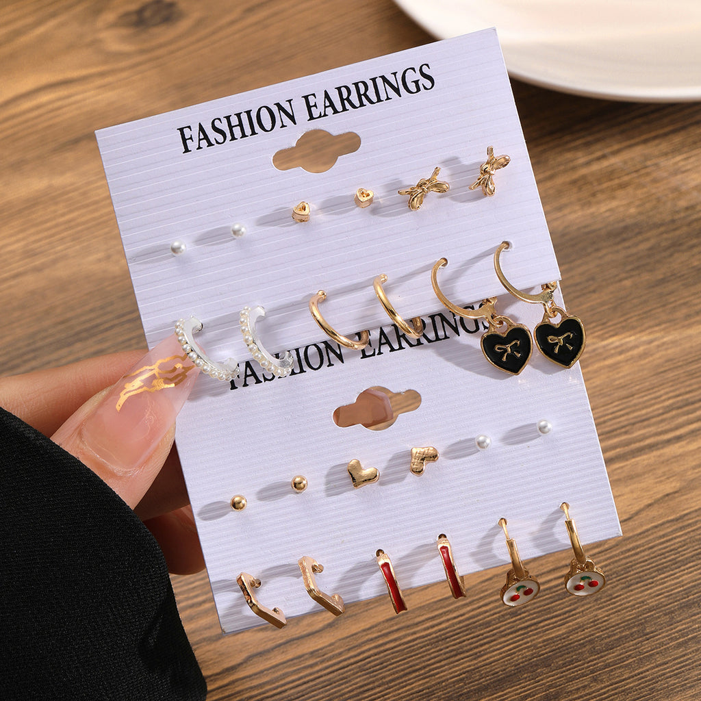 Damen Ohrringe Set mit funkelnden und romantischen Herzmotiven Shop Nory