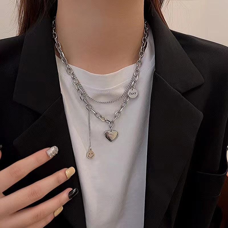 Damen Kette mit charmantem Herzen- und Smiley-Anhänger Shop Nory