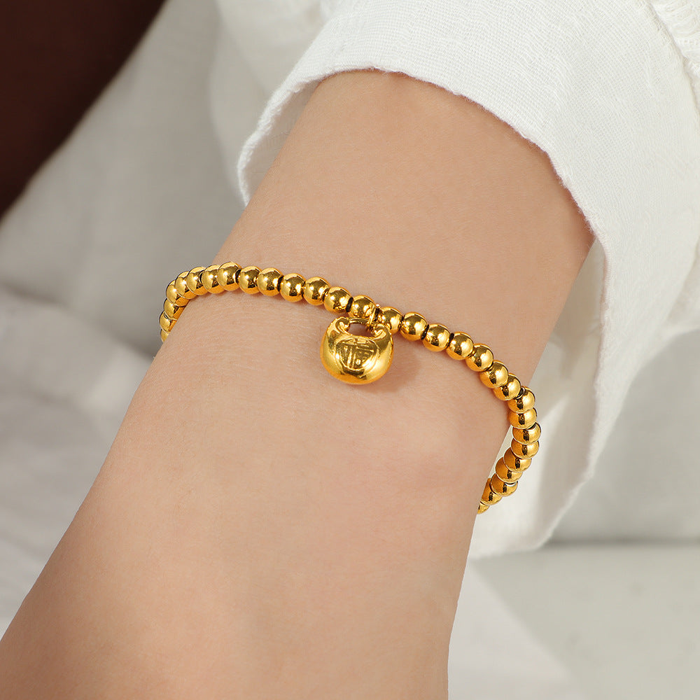 Damen elegantes Armband mit feinen Perlen und charmantem Anhänger Shop Nory