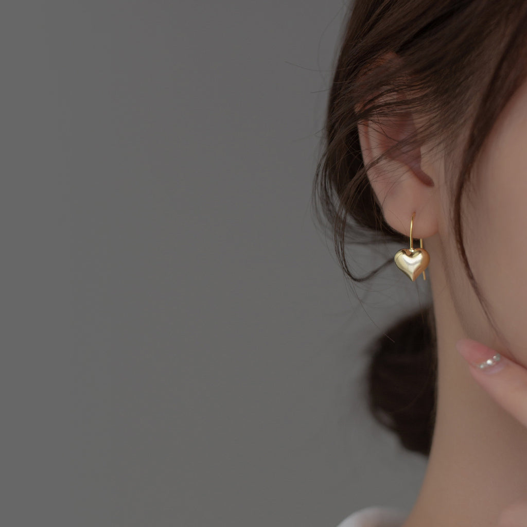 Damen Ohrringe mit stilvollem Herzdesign Shop Nory