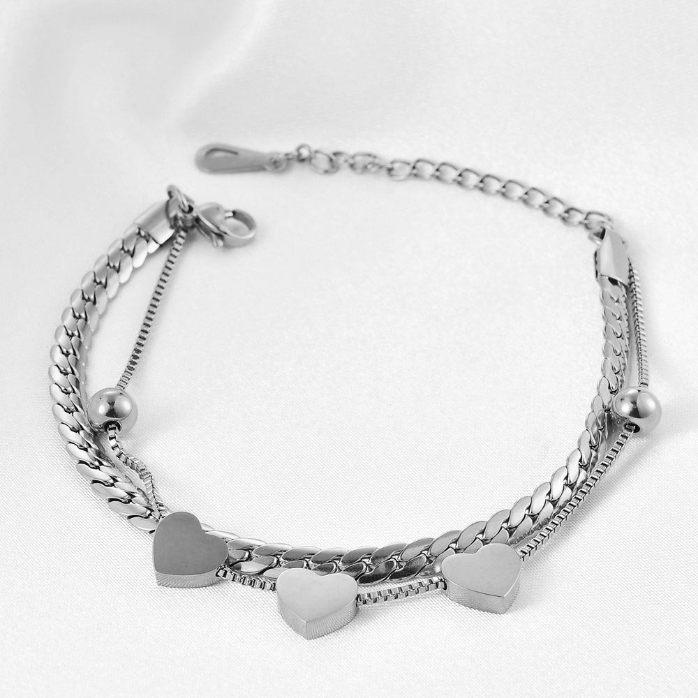 Damen Armband mit elegantem Herzdesign und feinen Kettengliedern Shop Nory