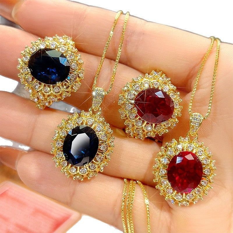 Vintage Inspirierte Oval Gemstein Halo Anhänger Halskette Mit Zirkonia Akzenten Und Vergoldeter Kette