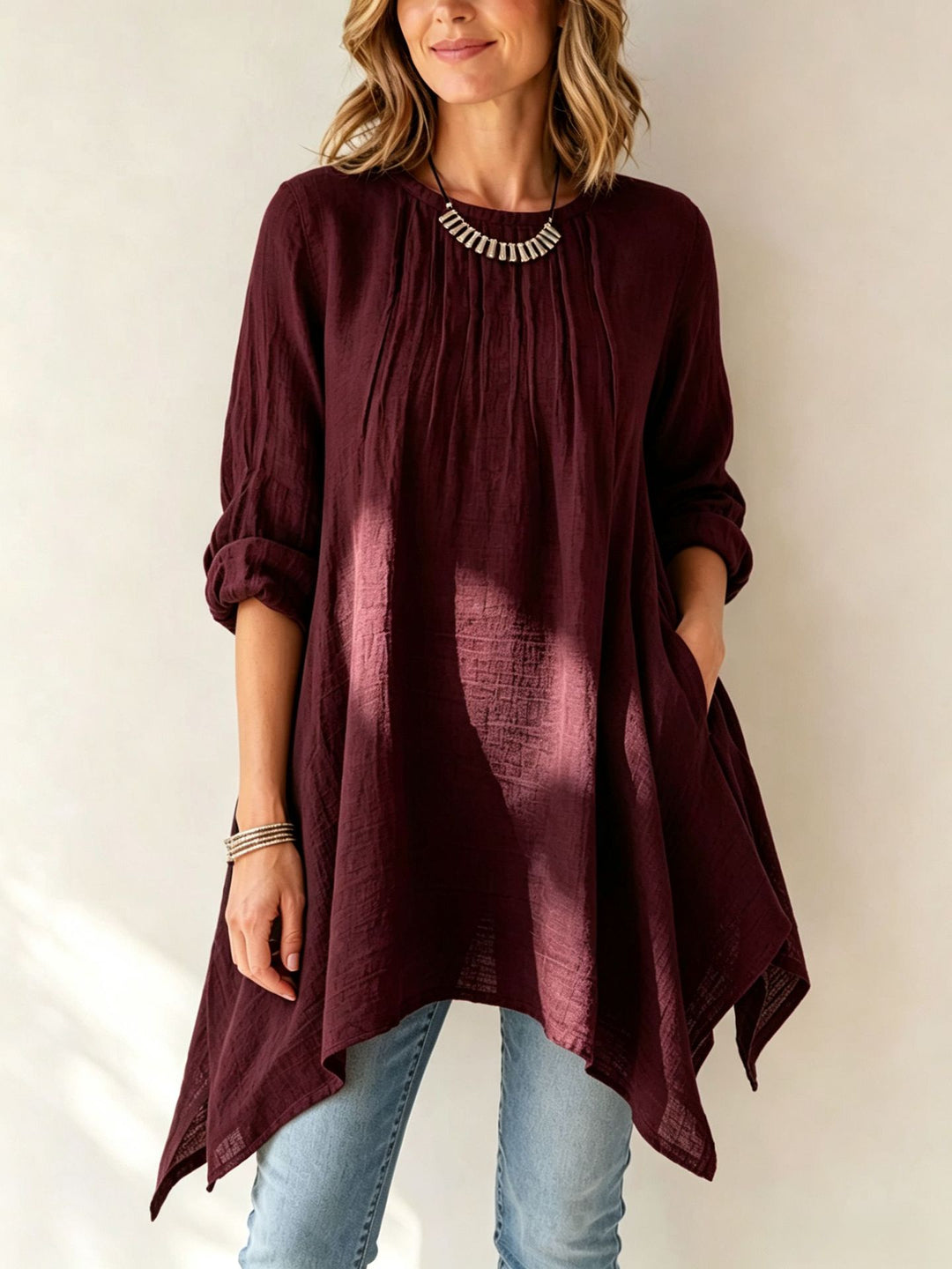 Damen Lässige Tunika-Bluse mit asymmetrischem Saum, feiner Waffelstruktur und Kellerfalten Shop Nory