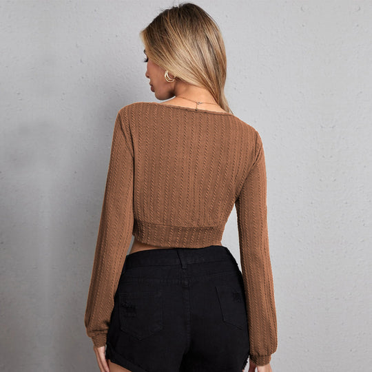 Damen gestricktes Cropped-Wickeltop mit V-Ausschnitt, taillierter Unterbrustnaht und Zopfmuster-Optik Shop Nory