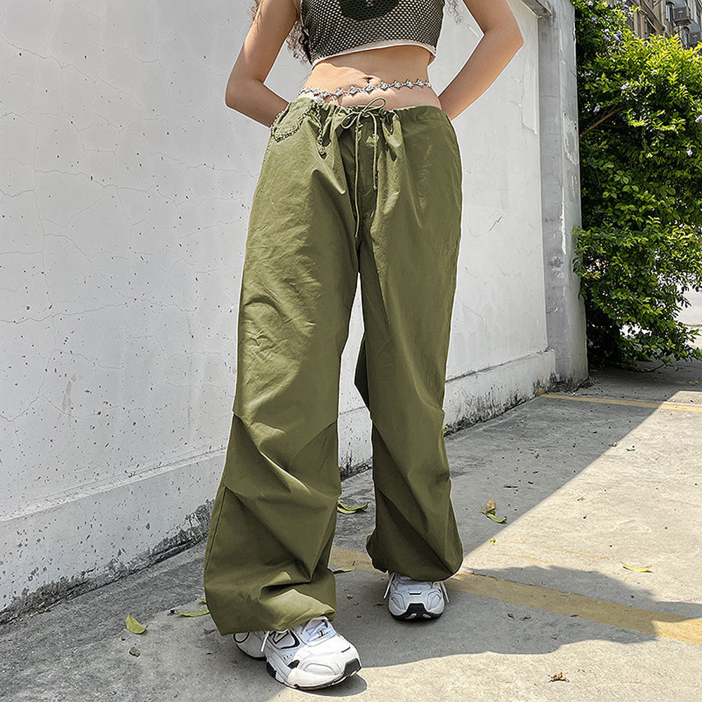 Damen Weite Sporthose mit elastischem Bund und stylischen Ketten-Details