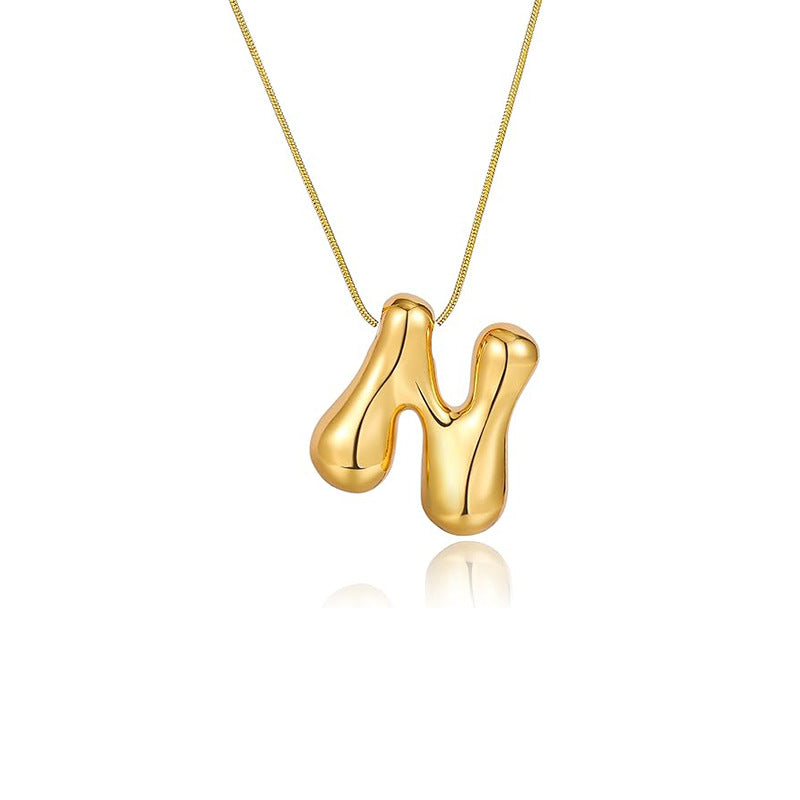 Damen Halskette mit skulpturalem Anhänger und feinem Gliederdesign Shop Nory