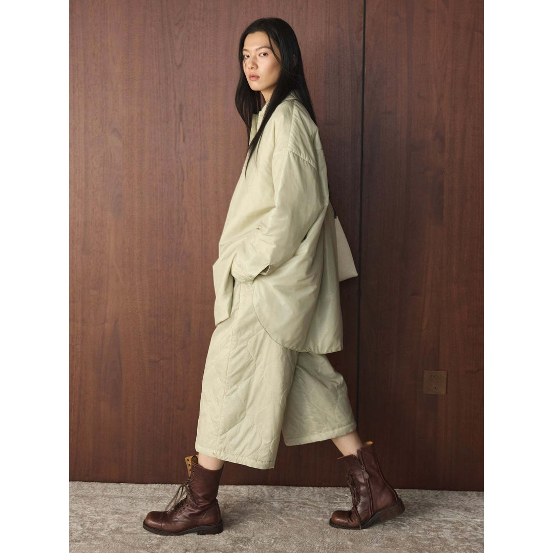 Damen Locker geschnittene gesteppte Oversize-Hemdjacke mit Kentkragen und verdeckter Knopfleiste Shop Nory
