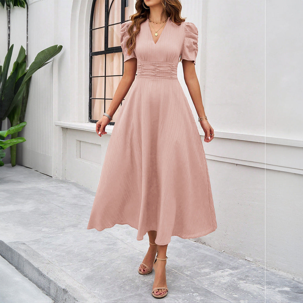 Damen Maxikleid mit elegant verarbeiteten Puffärmeln und taillierter Silhouette Shopnory