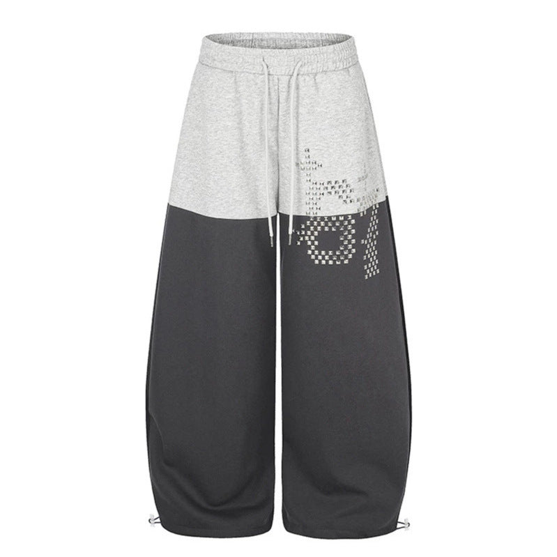Damen Oversize Two‑Tone Palazzo‑Sweathose aus French Terry mit Logo‑Nieten, Tunnelzug und verstellbarem Saum Shop Nory