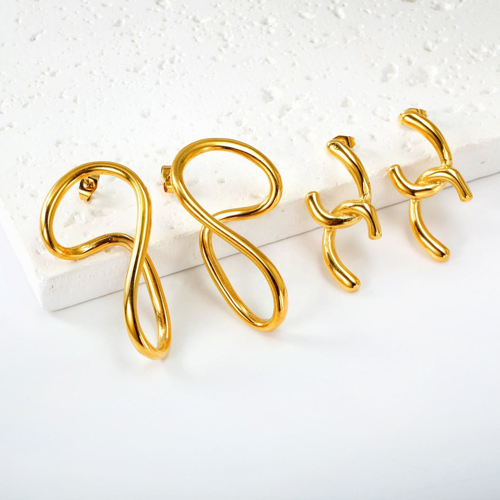 Damen moderne geschwungene Edelstahl-Ohrstecker Shop Nory