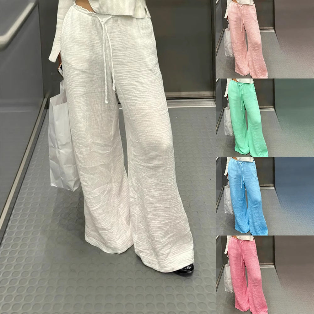 Damen Leinenhose mit lockerer, knöchellanger Passform, seitlichen Eingrifftaschen und Zierknopf-Details Shop Nory