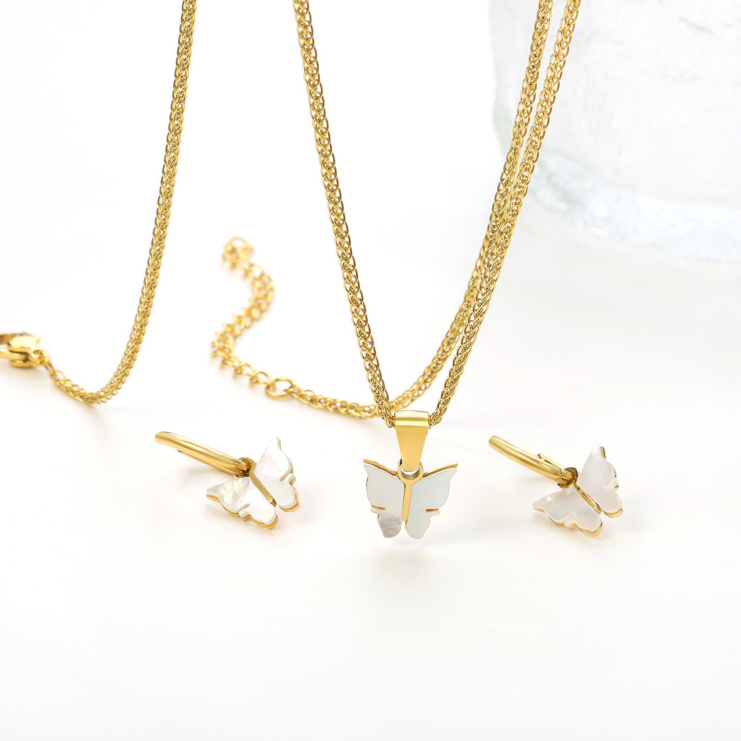 Damen Schmuckset mit filigranen Schmetterlingsanhängern und Ohrringen Shop Nory