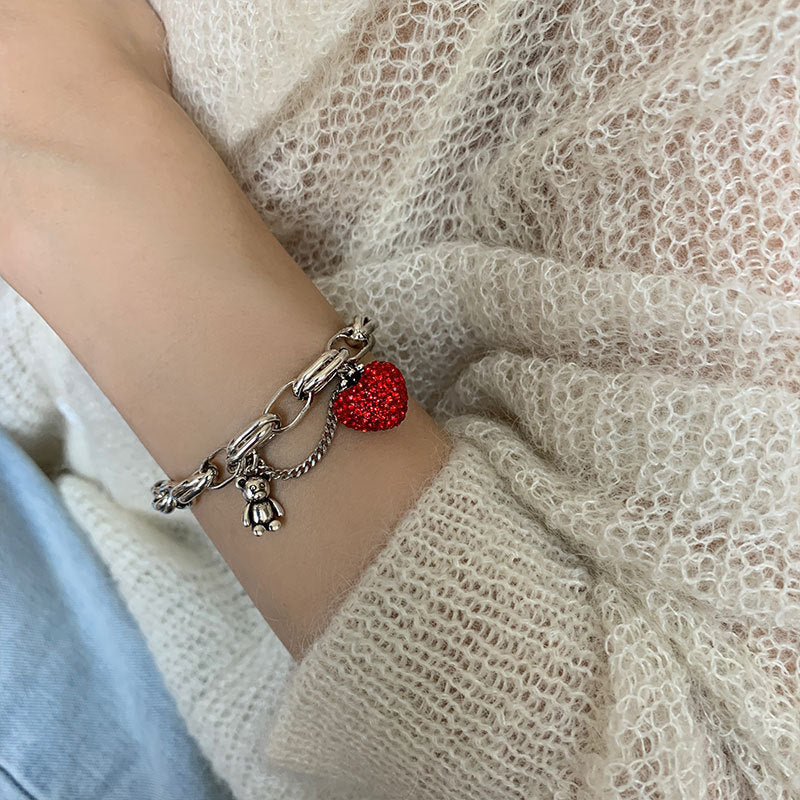 Damenarmband mit herzförmigem Anhänger und funkelnden Details Shop Nory