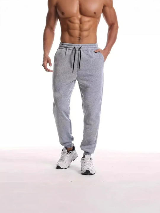 Unisex nan athleisure Jogginghose mit innen angerautem Fleece, elastischem Kordelbund und gerippten Knöchelabschlüssen Shop Nory