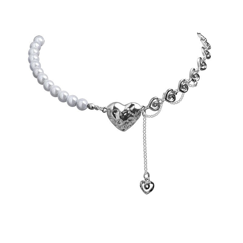 Damen Halskette mit verspieltem Herz-Design und edlen Perlenakzenten Shop Nory