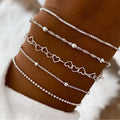 Damen Armreifen-Set mit zarten Herz- und Perlendetails Shop Nory