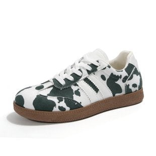 Damen Retro-Lowtop-Sneaker mit Kuhflecken-Print und gepolsterter Komfortsohle Shop Nory