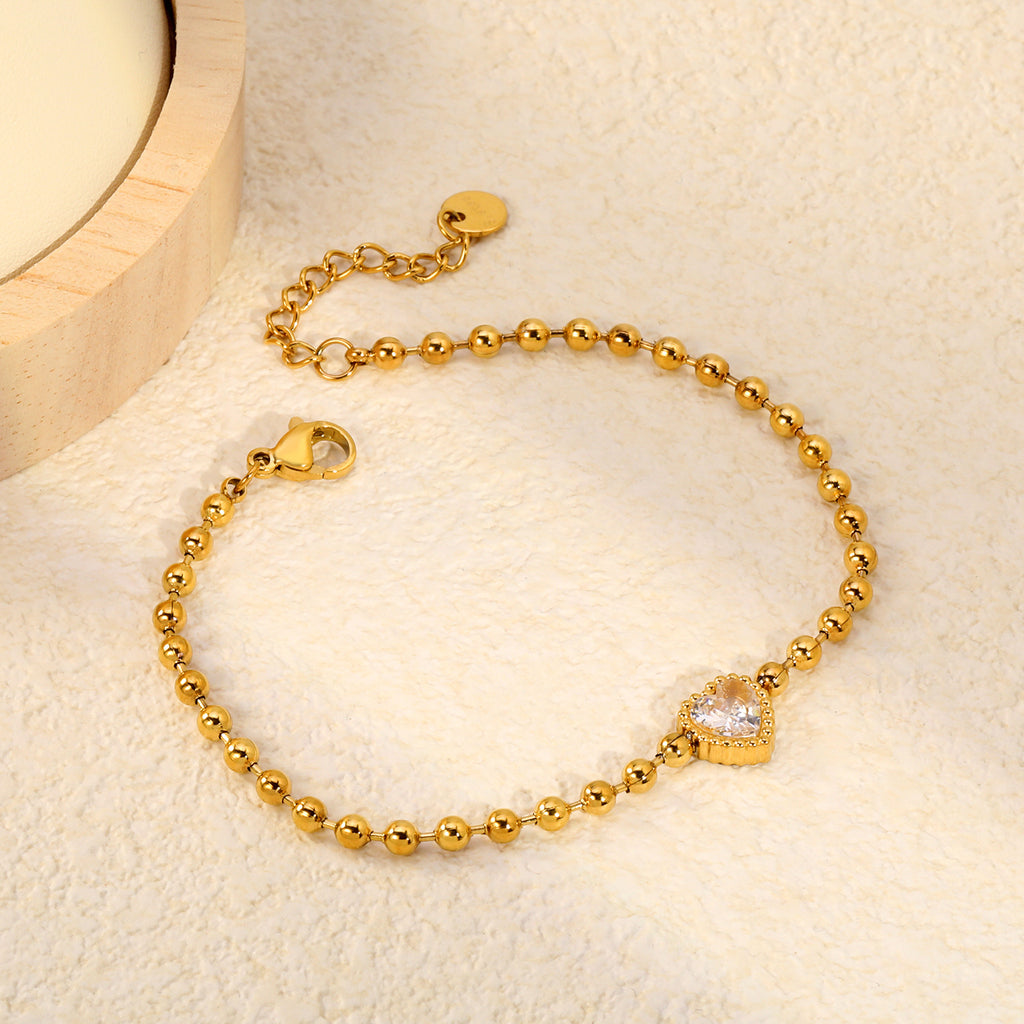 Damen Armband mit herzförmigem Kristallanhänger und eleganter Gliederkette Shop Nory