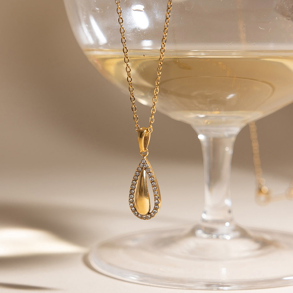Damen Halskette mit tropfenförmigem Anhänger und Zirkonia-Besatz Shop Nory
