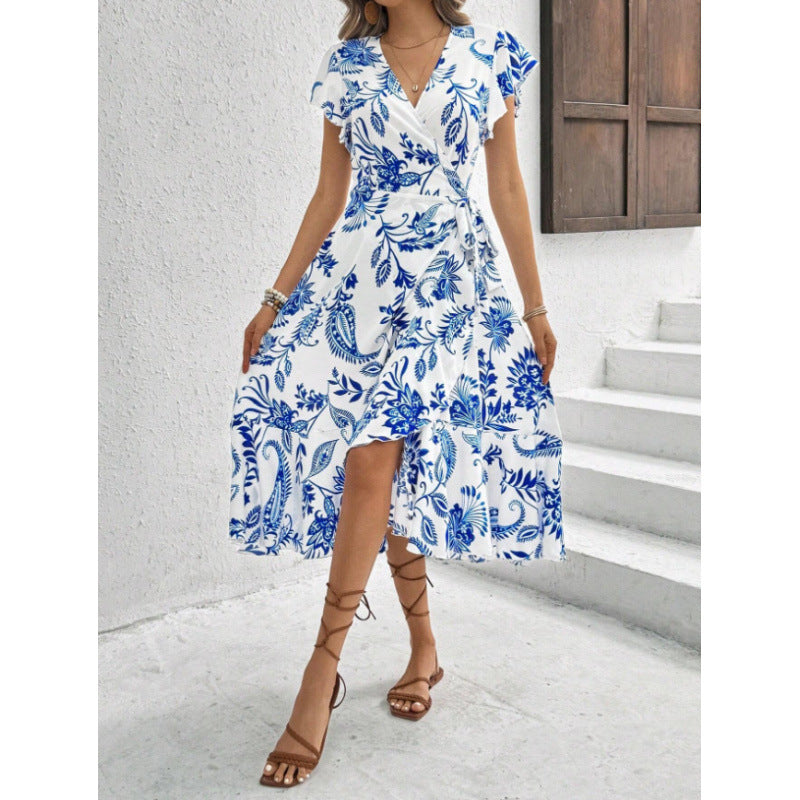 Damen Wickelkleid mit floralem Muster und fließendem Saum Shopnory