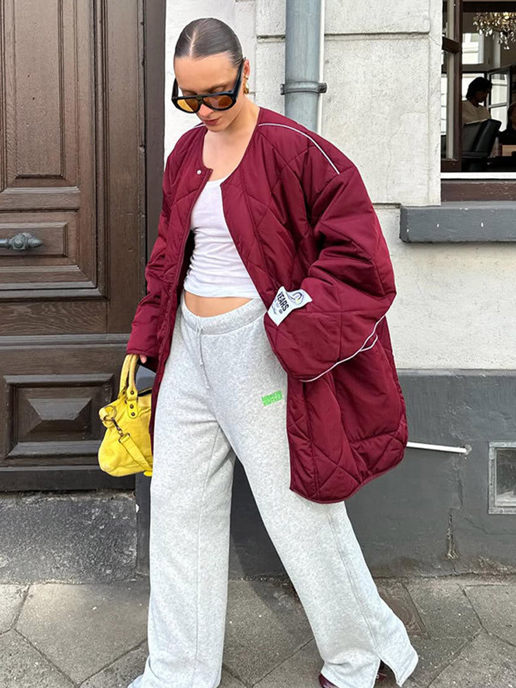 Damen Oversize-Steppjacke mit Diamantstepp, kontrastierender Paspel und Druckknopfverschluss Shop Nory