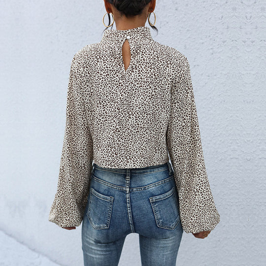 Damen Kurzgeschnittene Twist‑Bluse mit Stehkragen, Knotenfront und Allover Animalprint Shop Nory