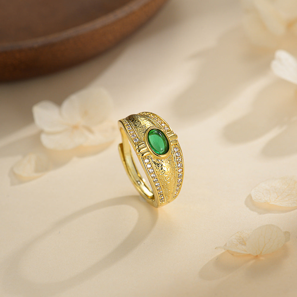 Damen Ring mit funkelndem Stein und kunstvollem goldenen Design Shop Nory
