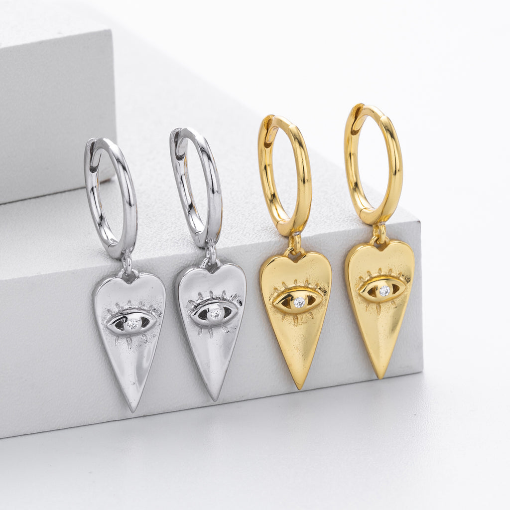 Damen Ohrringe mit herzförmigem Anhänger und schützendem Augenmotiv Shop Nory