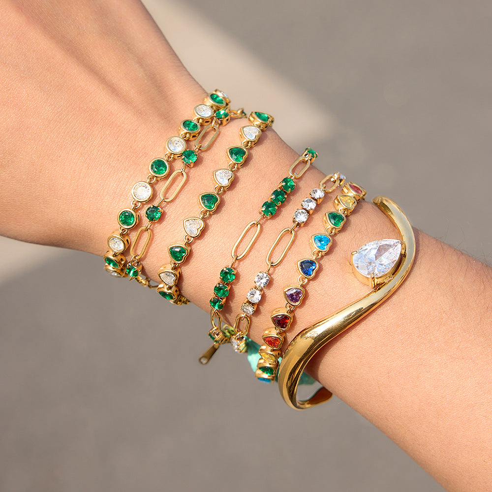 Damen Armband mit funkelnden grünen Kristallen und eleganter Edelstahlverarbeitung Shop Nory
