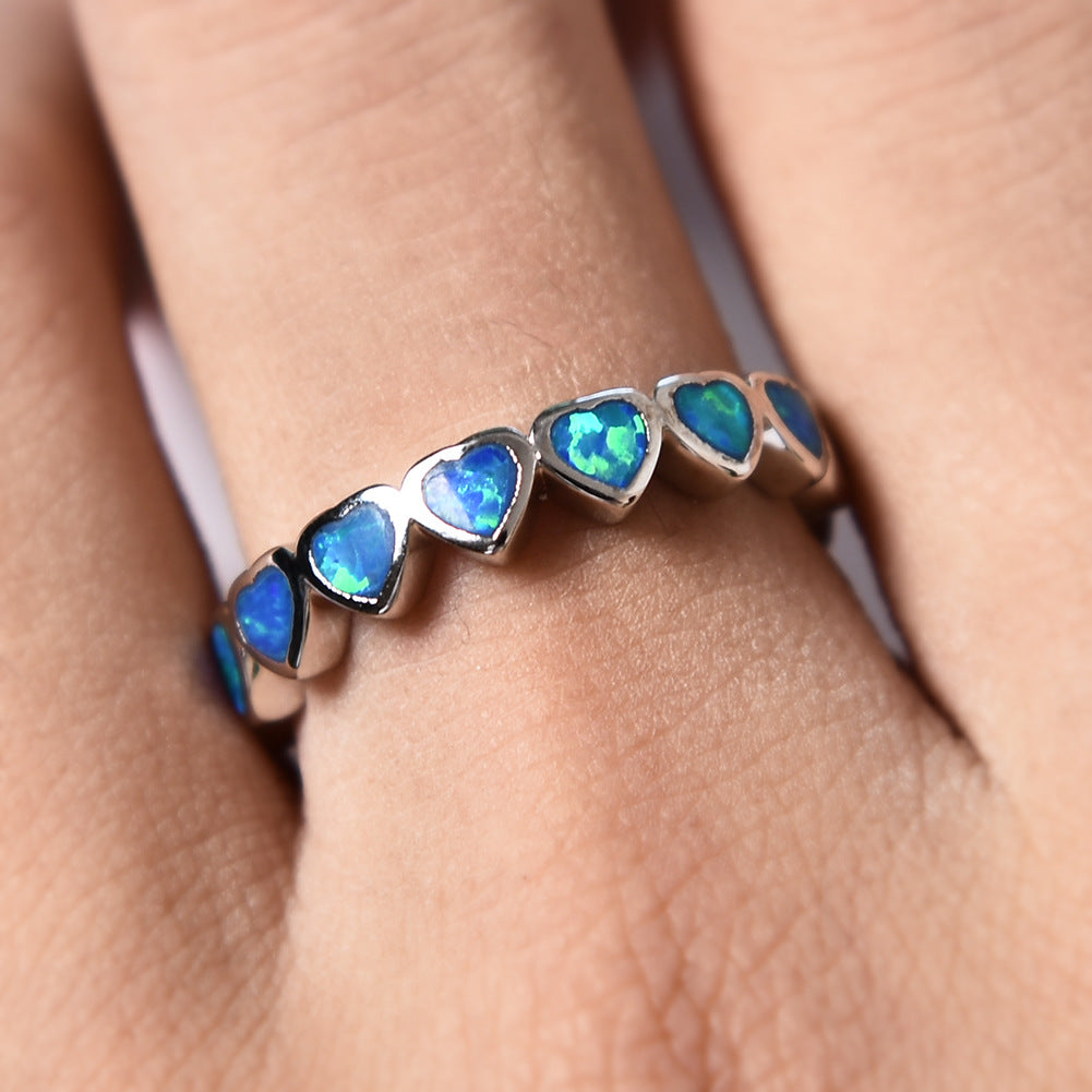 Damen Ring mit schillernden Opalsteinen und eleganter Edelstahlfassung Shop Nory