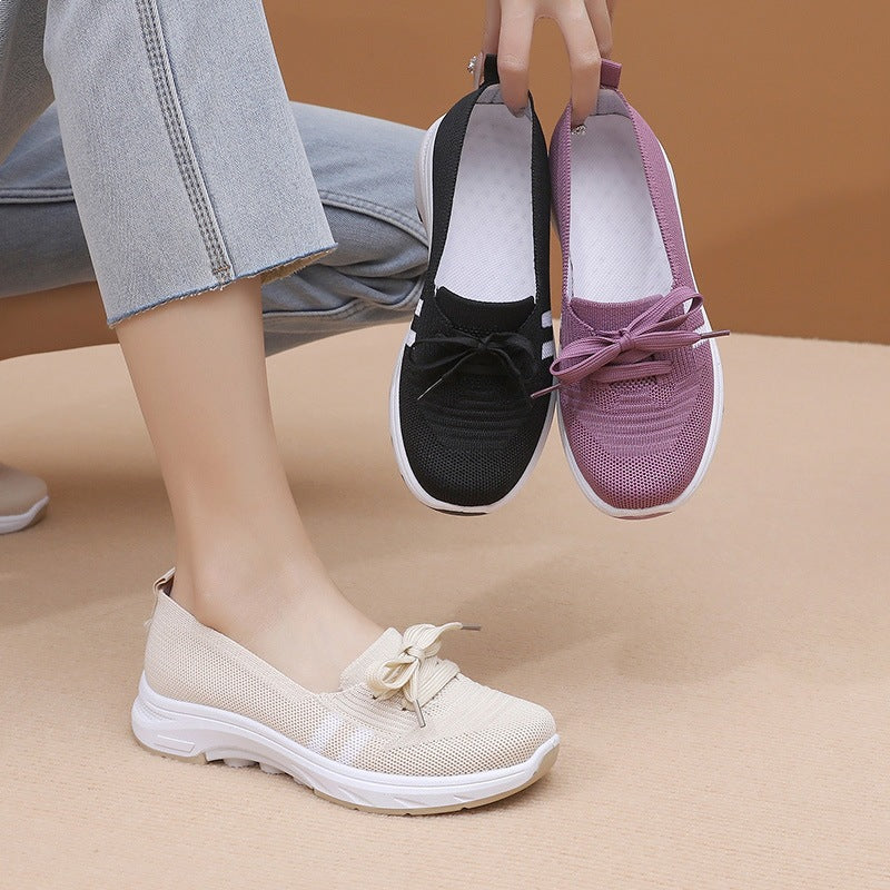 Damen Schlupf-Strick-Sneaker mit dekorativer Schleife und gedämpfter Plateausohle Shop Nory