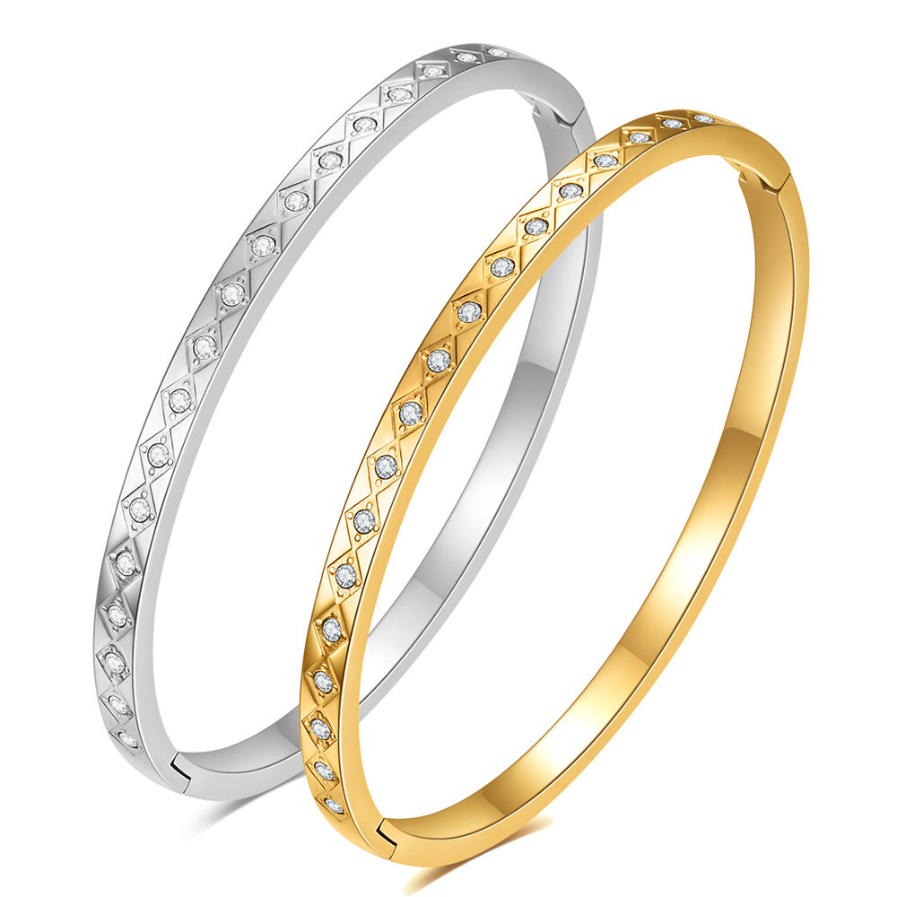 Damen Armreif mit funkelnden Zirkonia und kunstvollem Design Shop Nory