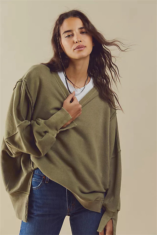 Damen oversized Sweatshirt mit Ballonärmeln, offenen Saumnähten und seitlichen Schlitzen Shop Nory