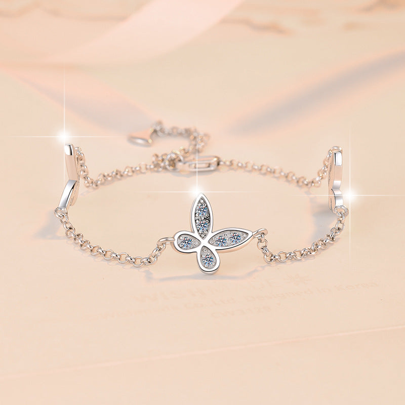 Damenarmband mit verspieltem Schmetterlingsdesign und funkelnden Zirkonia Shop Nory