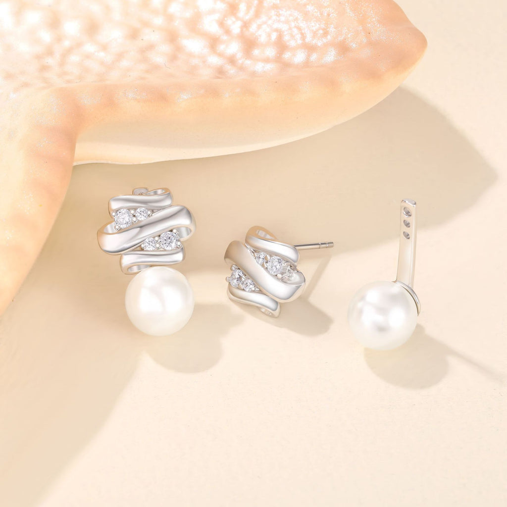 Damen Ohrstecker mit modernem, geschwungenem Design und funkelnden Kristallen Shop Nory