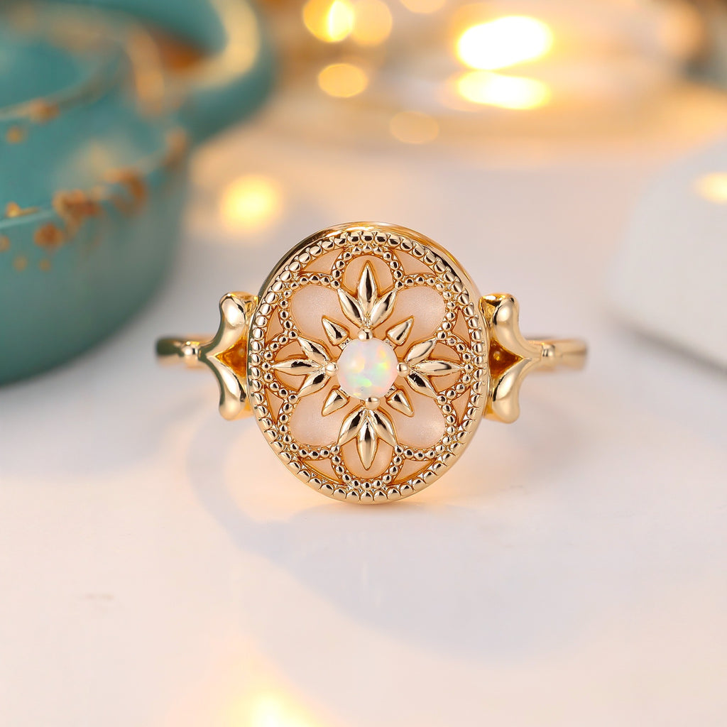 Damen Schmuckring mit filigraner Blütenstruktur und schimmerndem Opal Shop Nory