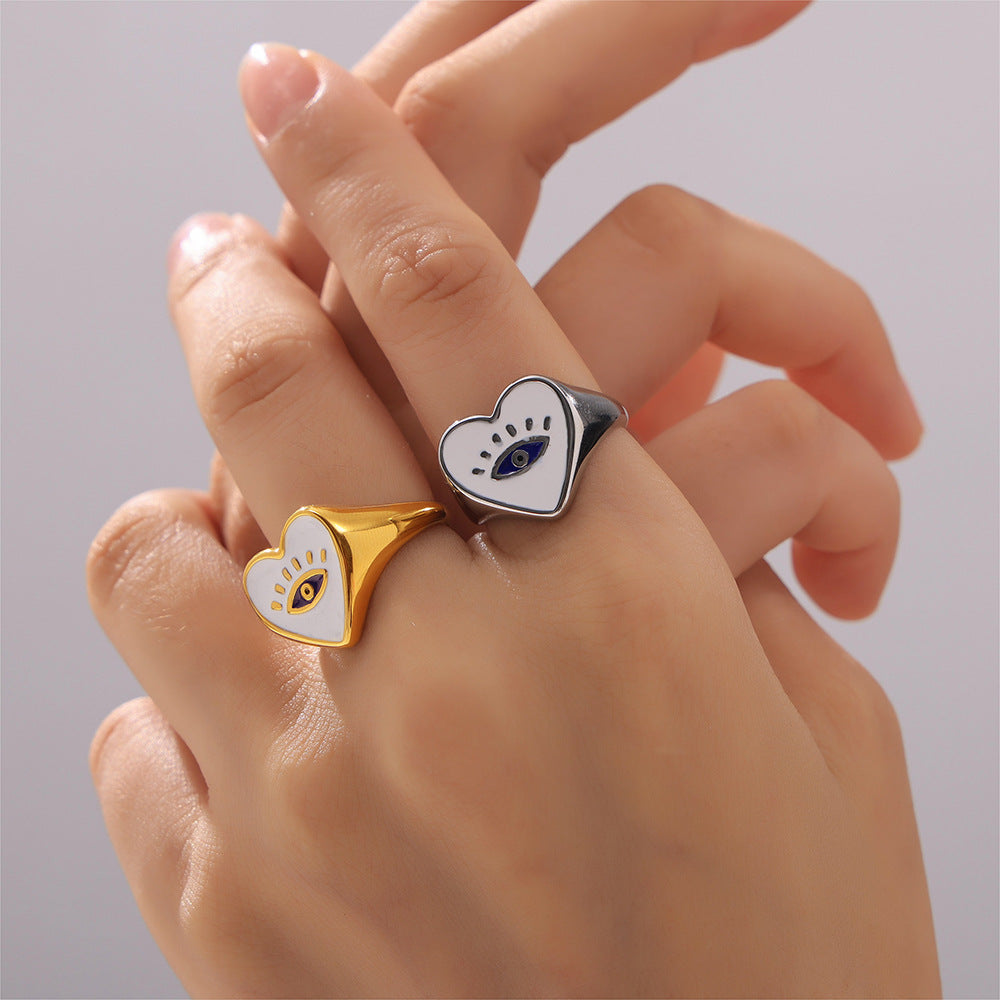 Damenring mit herzförmigem Design und Eye-Emblemen Shop Nory