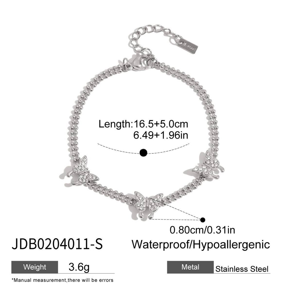Damen Armband mit eleganten Schmetterlingen und funkelnden Kristallen Shop Nory