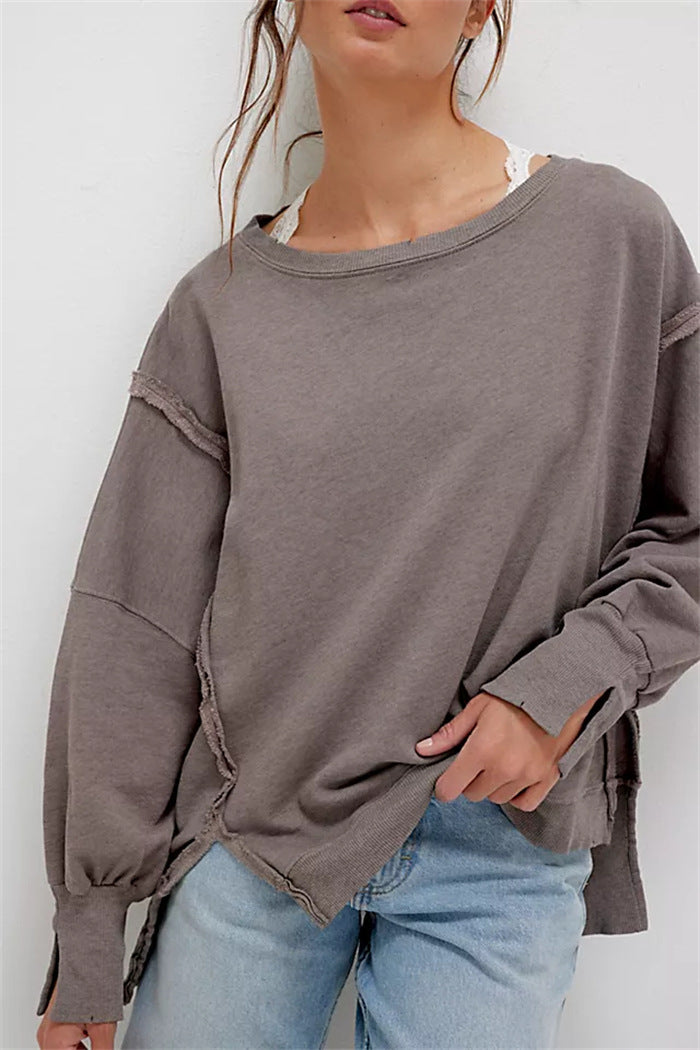 Damen oversized Sweatshirt mit Ballonärmeln, offenen Saumnähten und seitlichen Schlitzen Shop Nory