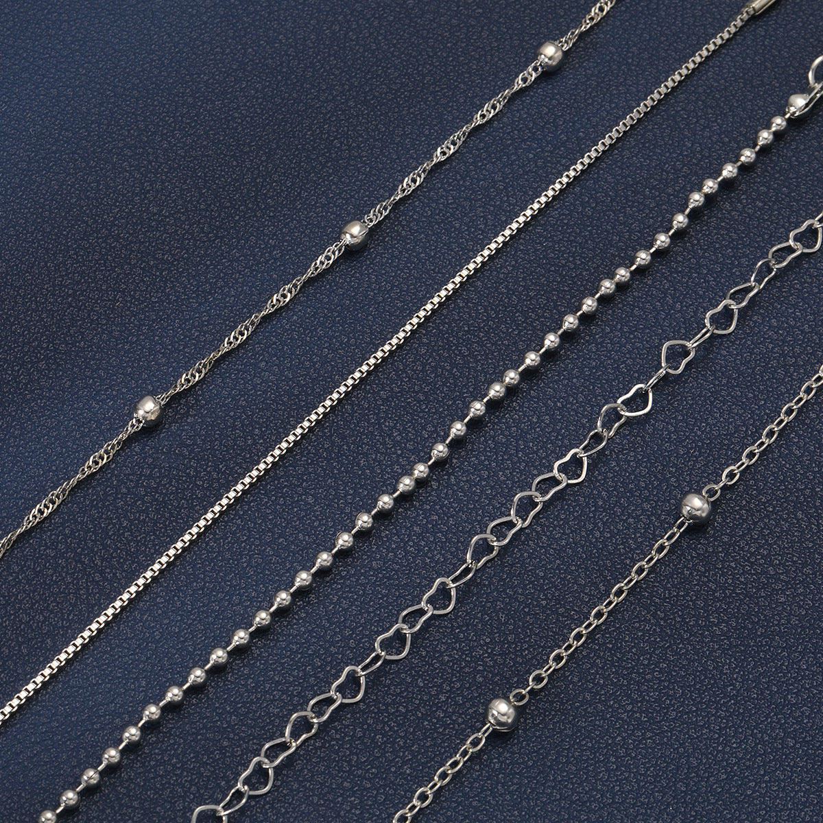 Damen Armreifen-Set mit zarten Herz- und Perlendetails Shop Nory