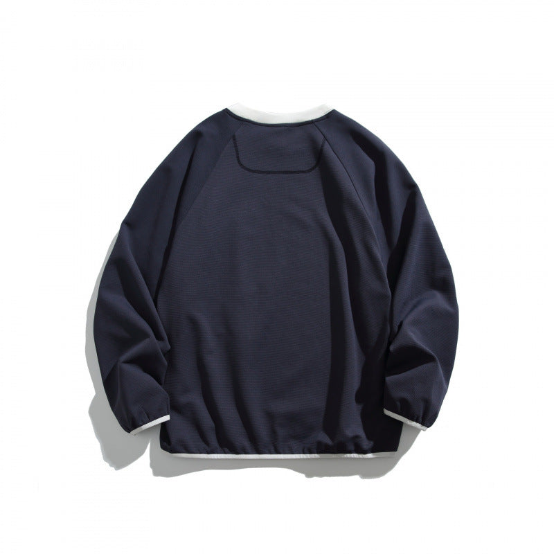 Unisex Oversize-Sweatshirt mit kontrastierter Brusttasche und Raglanärmeln Shop Nory