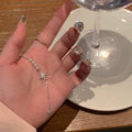 Damen funkelnde Handkette mit Perlen und Sternen Anhänger Shop Nory
