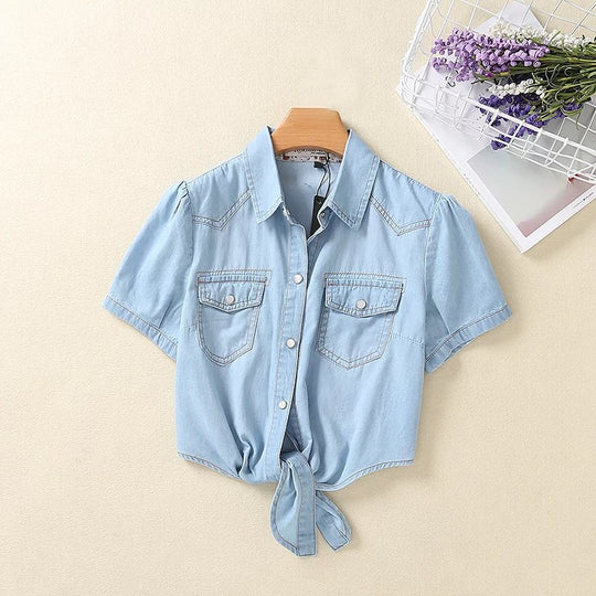 Damen Geknotete Denim Kurzbluse mit Brusttaschen und hochgekrempelten Ärmeln Shop Nory
