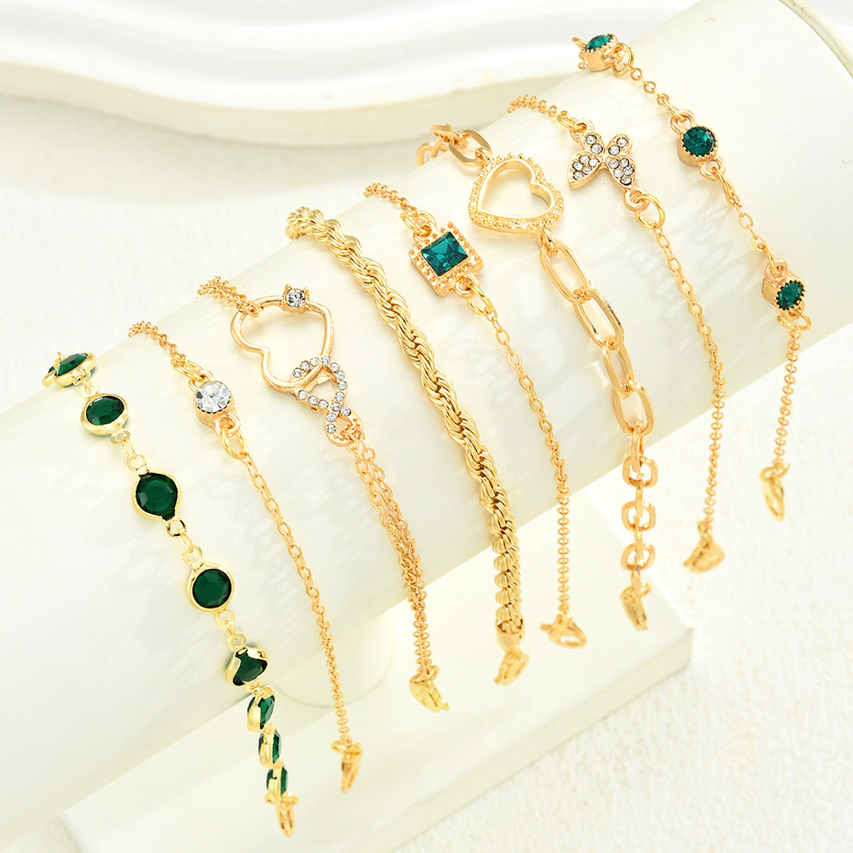 Damen Armband-Set mit funkelnden und eleganten goldenen Verzierungen Shop Nory
