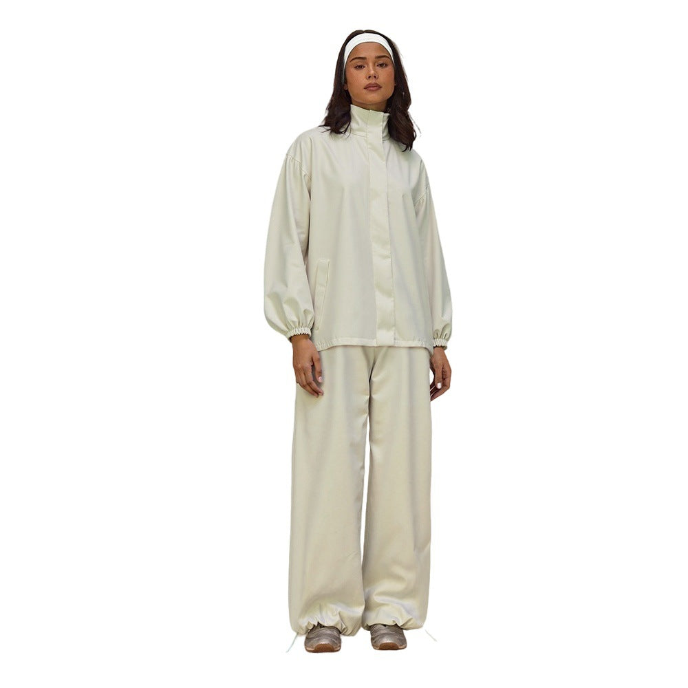 Damen Oversize-Trainingsset mit Stehkragen Ballonärmeln und weiten Kordelhosen Shop Nory