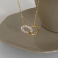 Damen Perlen- und Gold-Interlocking-Pendelkette Shop Nory