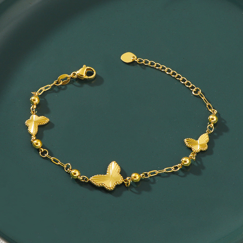 Damen zartes Armband mit filigranen Schmetterlings-Elementen Shop Nory
