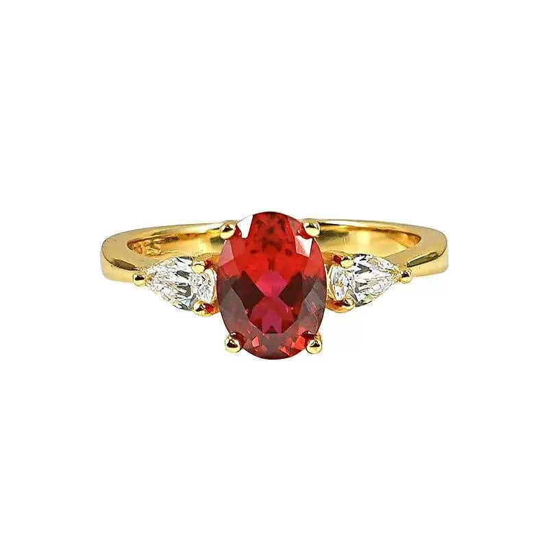 Damen eleganter Ring mit rot glühendem Edelstein und funkelnden Zirkonia Shop Nory
