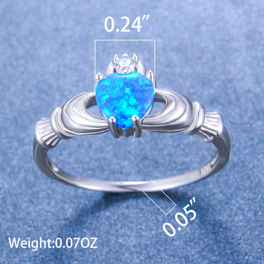 Damen Ring mit herzförmigem Opal und funkelnden Zirkonia-Elementen Shop Nory